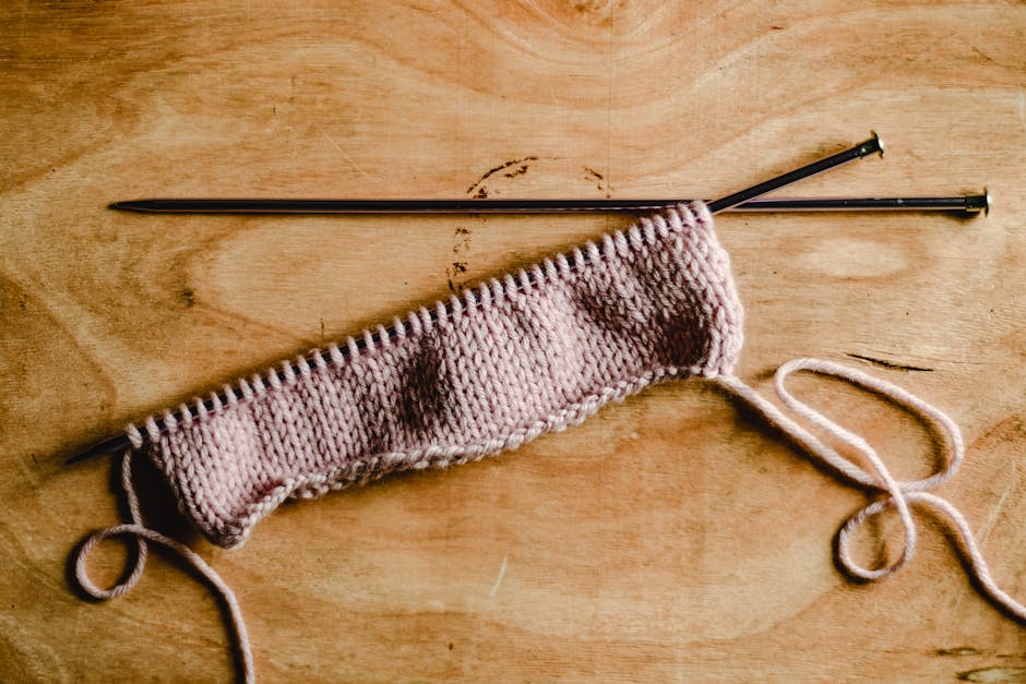Construction site with steel structure and cranes at sunset